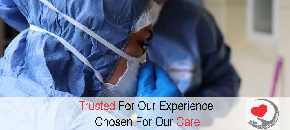Trauma Cleansing technicians in protective equipment — Trusted For Our Experience, Chosen For Our Care